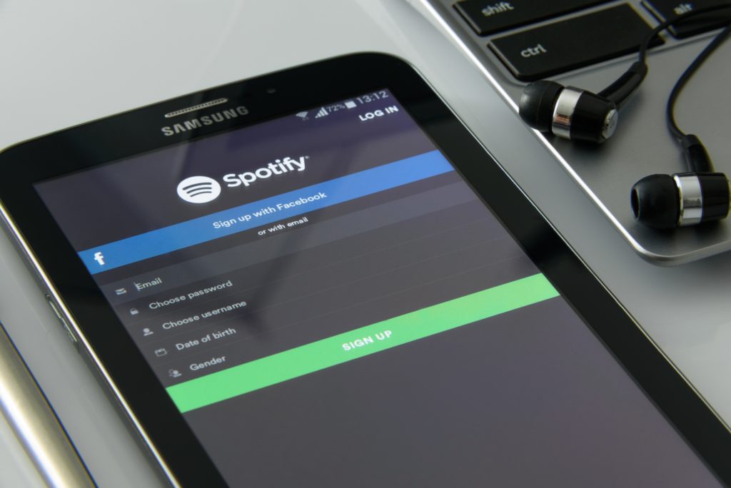 https://dailyalts.com/wp-content/uploads/2020/12/Spotify-Music-application-on-screen-of-Smartphone-scaled.jpg